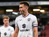 Warren O’Hora has signed a new contract at MK Dons