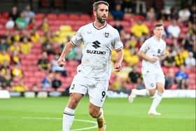 Will Grigg was withdrawn from the action before half-time at Vicarage Road, but it was always the plan to rest the Dons striker after just returning from injury
