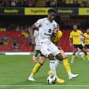 Daniel Oyegoke in action against Watford in MK Dons’ Carabao Cup win on Tuesday night