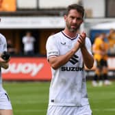 Will Grigg bagged his first goals for MK Dons after signing for the club again in the summer, taking his total to 32