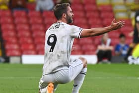 Will Grigg says he is keen to put his Sunderand experience behind him after finding the net for MK Dons against Morecambe on Saturday 