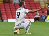 Will Grigg says he is keen to put his Sunderand experience behind him after finding the net for MK Dons against Morecambe on Saturday 