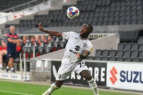Brooklyn Ilunga is an emerging talent at MK Dons, and Daniel Harvie has said he is on-hand to help the teenager as they play in a similar position