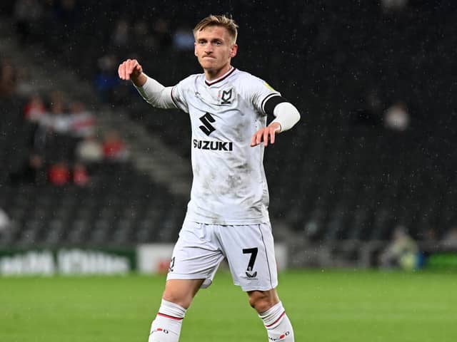 Matt Smith, who signed for the club from Manchester City last January, is one of many who have tried in vain to spark life into MK Dons in the centre of the park this season