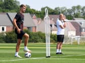 Could Jack Tucker and Liam Manning be training at the National Bowl any time soon? MK Dons have submitted plans to turn the music venue into a training ground once again