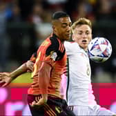 Matt Smith battles with Youri Tielemans during Wales’ defeat to Belgium on Thursday night