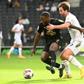 Striker Will Grigg had next to nothing to feed off against Peterborough on Saturday. Both Dons boss Liam Manning and wing-back Daniel Harvie said the side have to be braver in front of goal to create chances to score.