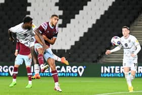 Matt Dennis came off the bench to head MK Dons into the lead just nine minutes later in a tough encounter with West Ham U21s. The striker would net again from the penalty spot with 15 minutes to go to secure the win in the Papa John’s Trophy