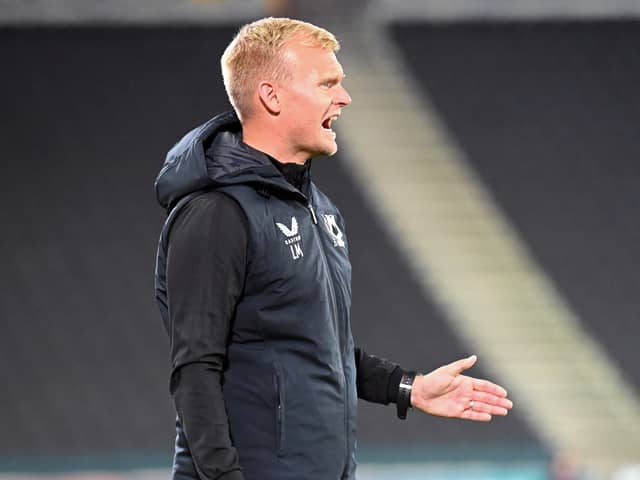 Dons boss Liam Manning said his side cannot keep waiting for the opposition to take the lead before they react. Dons went 2-0 before half-time against Shrewsbury.