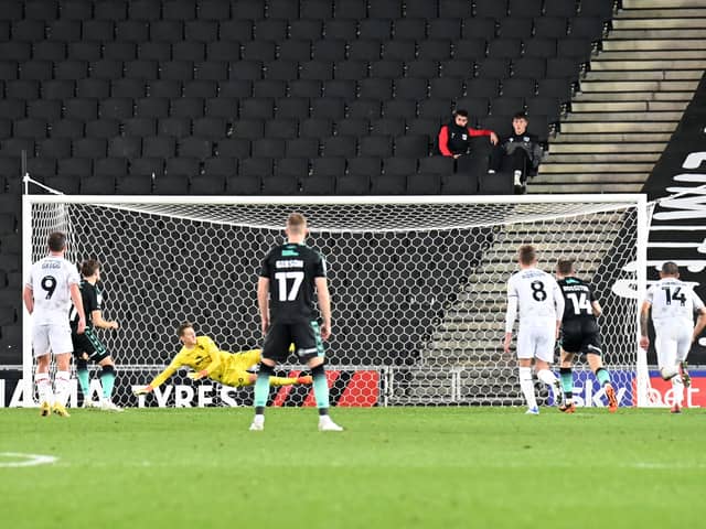 Antony Evans’ late penalty sent Jamie Cumming the wrong way as Bristol Rovers beat MK Dons on Tuesday night 