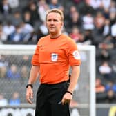 Referee Oliver Langford did not impress Dons boss Liam Manning for his performance at Stadium MK