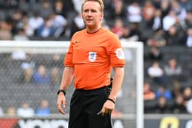 Referee Oliver Langford did not impress Dons boss Liam Manning for his performance at Stadium MK