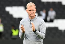 Dons boss Liam Manning