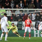 Will Grigg fired home a penalty in MK Dons’ 2-0 win over Charlton, though the foul on Louie Barry may have been outside the box