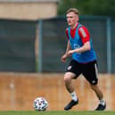 Matt Smith is the first MK Dons player to be a part of a World Cup squad, as he was included in Rob Page’s Welsh side to head to Qatar next week