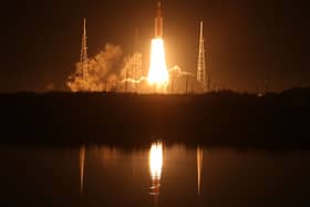 Artemis I Space Launch System (SLS) rocket, with the Orion capsule attached, launches at NASA's Kennedy Space Center on November 16