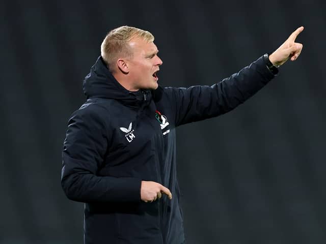 Dons boss Liam Manning