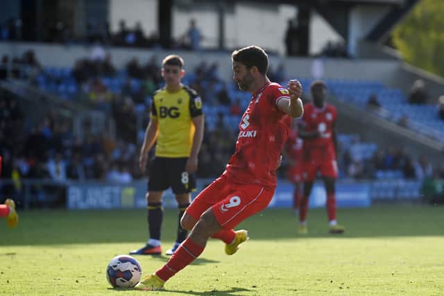 Grigg scored the winning penalty in the win over Oxford United at the Kassam Stadium