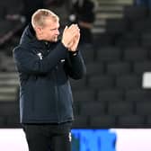 Liam Manning applauds the fans after his side’s 3-1 win over Newport County on Tuesday night