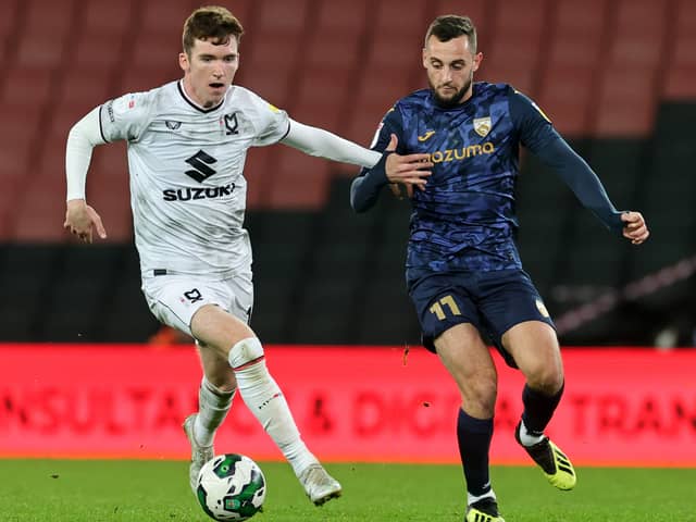Conor Grant has had a mixed season for MK Dons, but admitted he has improved a lot since his summer move from Rochdale