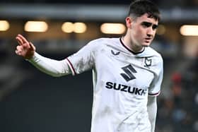 Dawson Devoy said the mood was a strange one in the MK Dons dressing room after losing 3-2 to Portsmouth