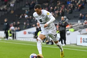 Nathan Holland in action for MK Dons