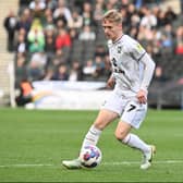 Matt Smith has returned from World Cup duty with Wales and is ready to hit the ground running for MK Dons again