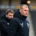 Liam Manning has been sacked by MK Dons, and will depart along with his backroom staff