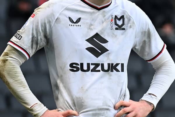 Castore will remain MK Dons’ kit supplier next year, despite their unpopular ‘down and dirty’ shirts this term