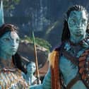 Ronal (Kate Winslet), Tonowari (Cliff Curtis), and the Metkayina Clan (Photo: © 2022 20th Century Studios)