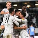 Jack Tucker believes MK Dons could spring a surprise result when they take on Leicester City at Stadium MK tomorrow night