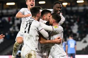 Jack Tucker believes MK Dons could spring a surprise result when they take on Leicester City at Stadium MK tomorrow night