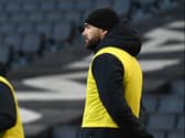 Bradley Johnson will take caretaker charge of MK Dons on Tuesday night