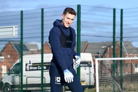 Goalkeeper Jamie Cumming will remain at MK Dons on loan from Chelsea until the end of the season