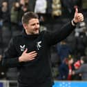 Mark Jackson celebrating the win over Forest Green Rovers - his first game in charge of MK Dons