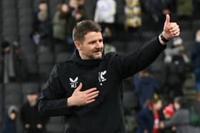 Mark Jackson celebrating the win over Forest Green Rovers - his first game in charge of MK Dons