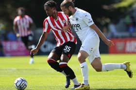 Paris Maghoma in action for Brentford