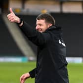 Mark Jackson celebrated his third victory in charge of MK Dons