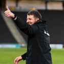 Mark Jackson celebrated his third victory in charge of MK Dons