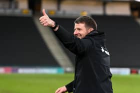 Mark Jackson celebrated his third victory in charge of MK Dons