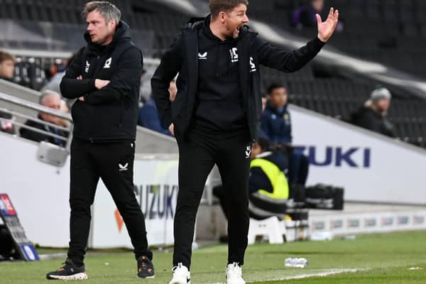 It was a frustrating afternoon at the office for Mark Jackson as he watched MK Dons lose grip of their 1-0 lead over Oxford to draw 1-1