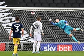 Karl Robinson felt his Oxford side, who drew level courtesy of this Lewis Bate strike, deserved to beat MK Dons on Saturday