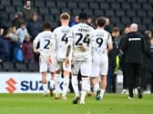 MK Dons leave the pitch following the 1-0 defeat to Ipswich Town
