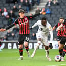 Mo Eisa in action for Dons against Ipswich Town