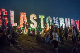 Festival-goers enjoy the atmosphere prior to the 2013 Glastonbury Festival at Worthy Farm. (Photo by Ian Gavan/Getty Images)