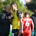 Liam Manning with former Oxford United defender John Mousinho, now manager of Portsmouth