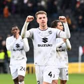 Jack Tucker starred against Cambridge United, and he hopes to have answered a few questions about Dons’ resolve with the clean sheet at Stadium MK