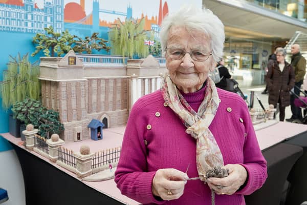 A 93-year-old great-great-gran who has a British Empire Medal (BEM) for her knitting has since created a massive 6ft Buckingham Palace out of wool.
