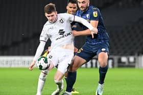 Conor Grant in action against Morecambe when the sides met in the Carabao Cup earlier this season