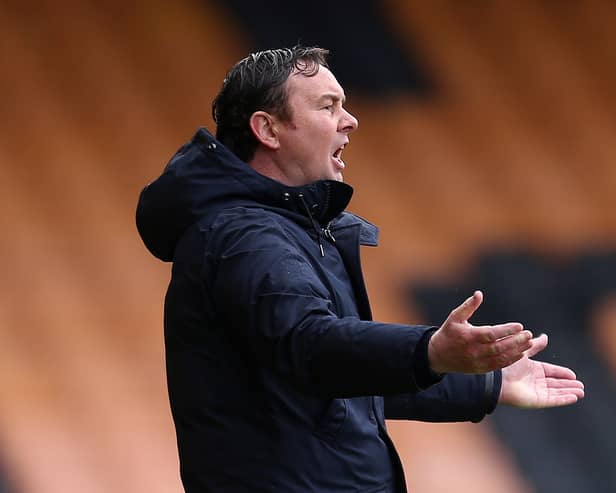 Morecambe boss Derek Adams
